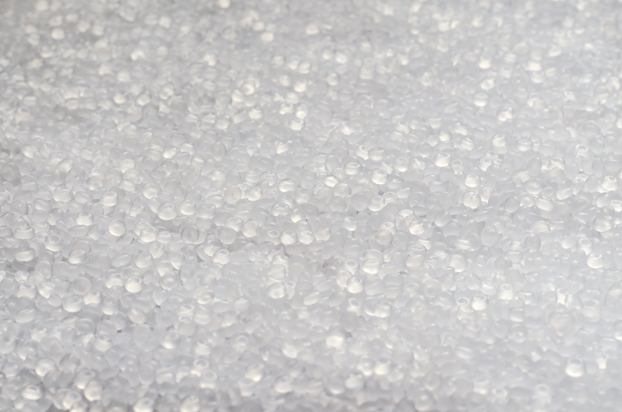 Polypropylene granule close-up background texture